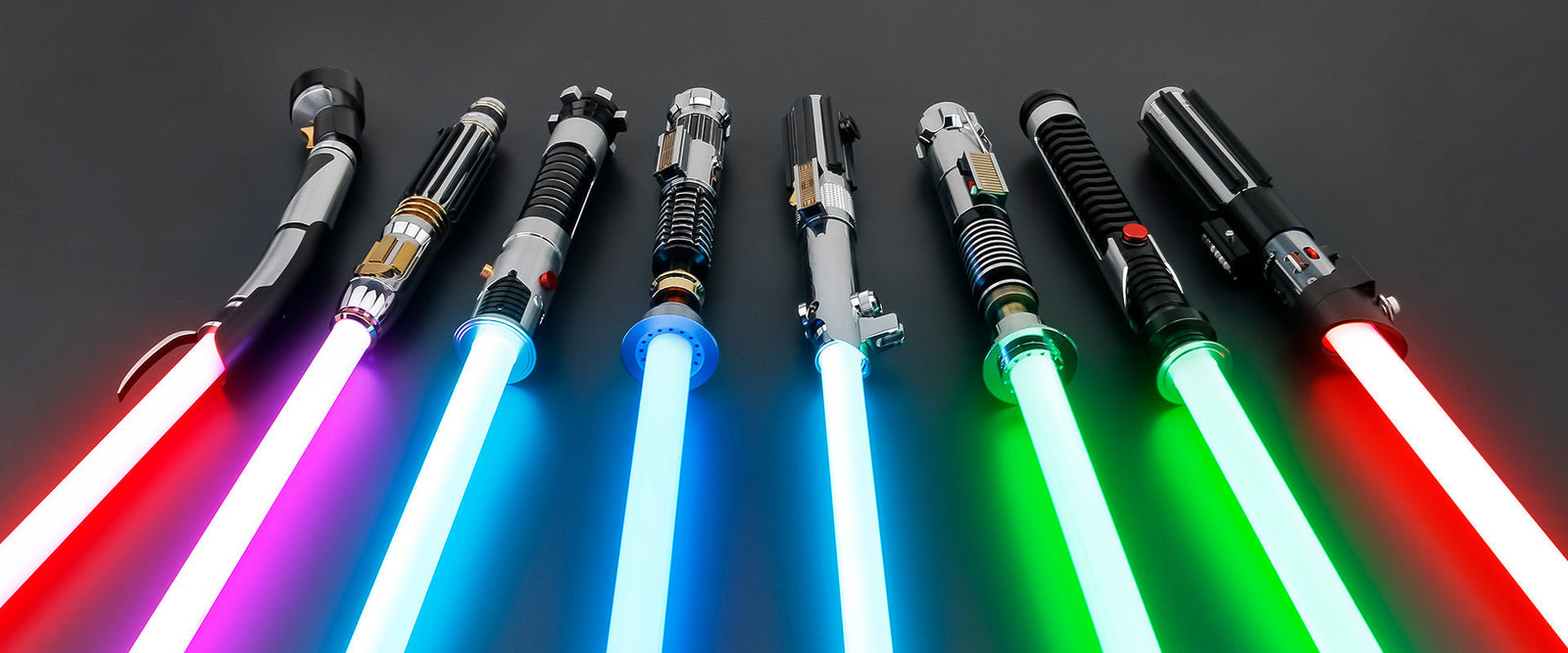 Lightsaber colours explained showing blue green red and purple lightsaber blades